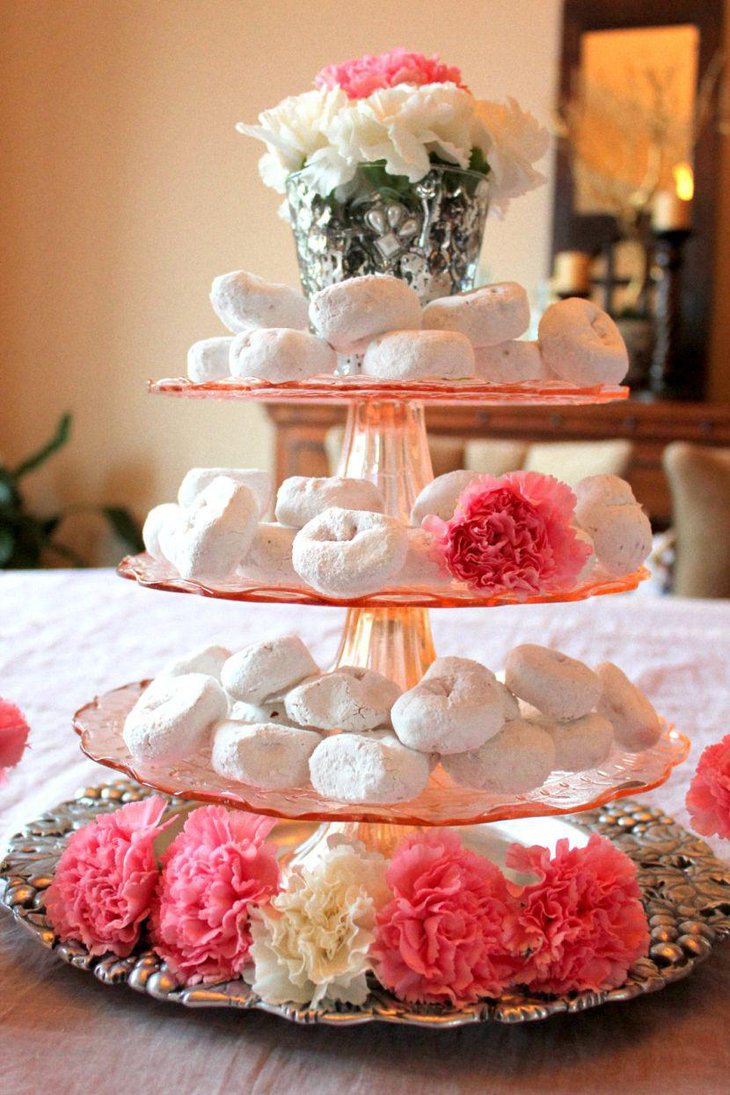 Fantastic spring centerpeice idea with white sweets and flowers in tiered tray