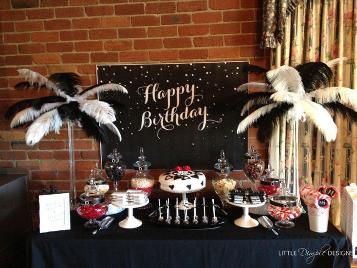 Glam adult birthday table decor in black and white theme