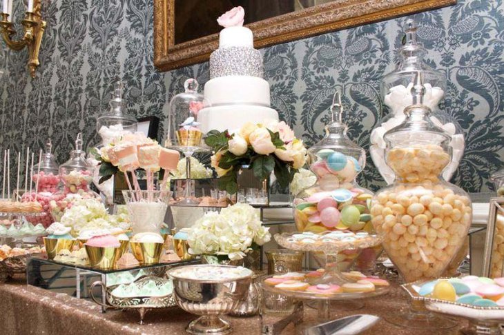 Gold and pastel decor on European dessert table