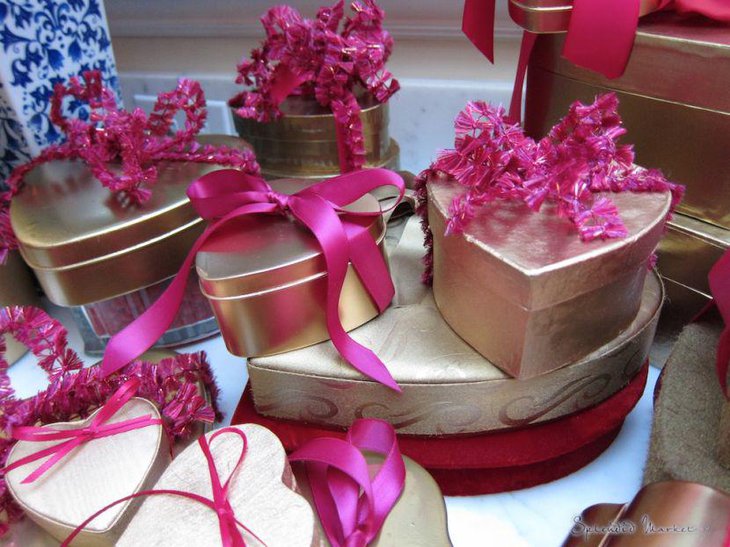 Golden heart shaped gift boxes vignette Valentines centerpieces