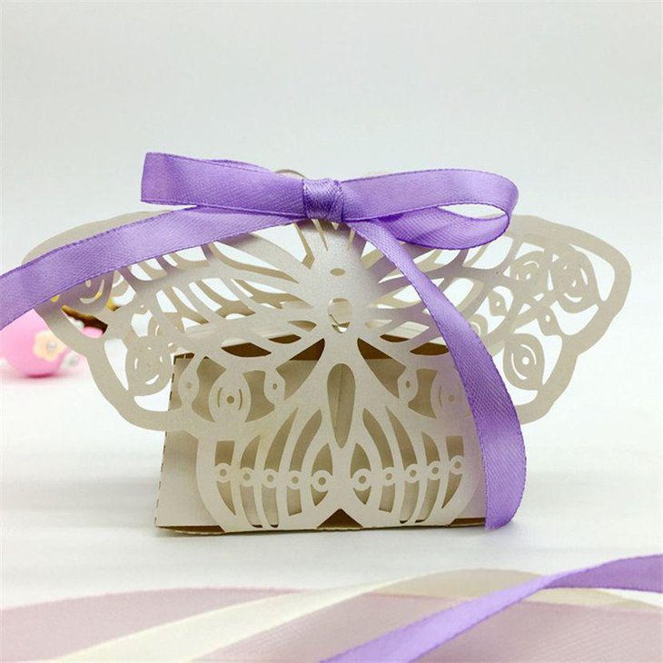 Gorgeous butterfly baby shower favor with purple ribbon