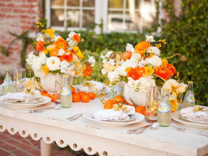 Gorgeous citrus and floral spring table setting