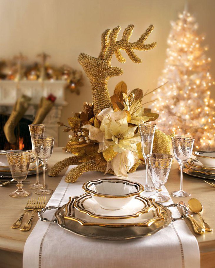 Gorgeous dinner table decoration with golden deer centerpiece