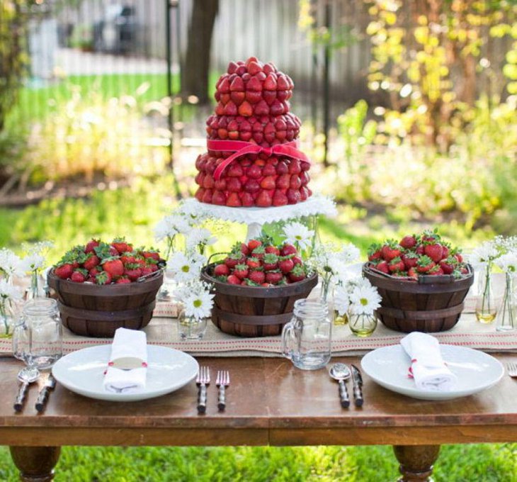Gorgeous garden party table decor with apple holder and rustic baskets