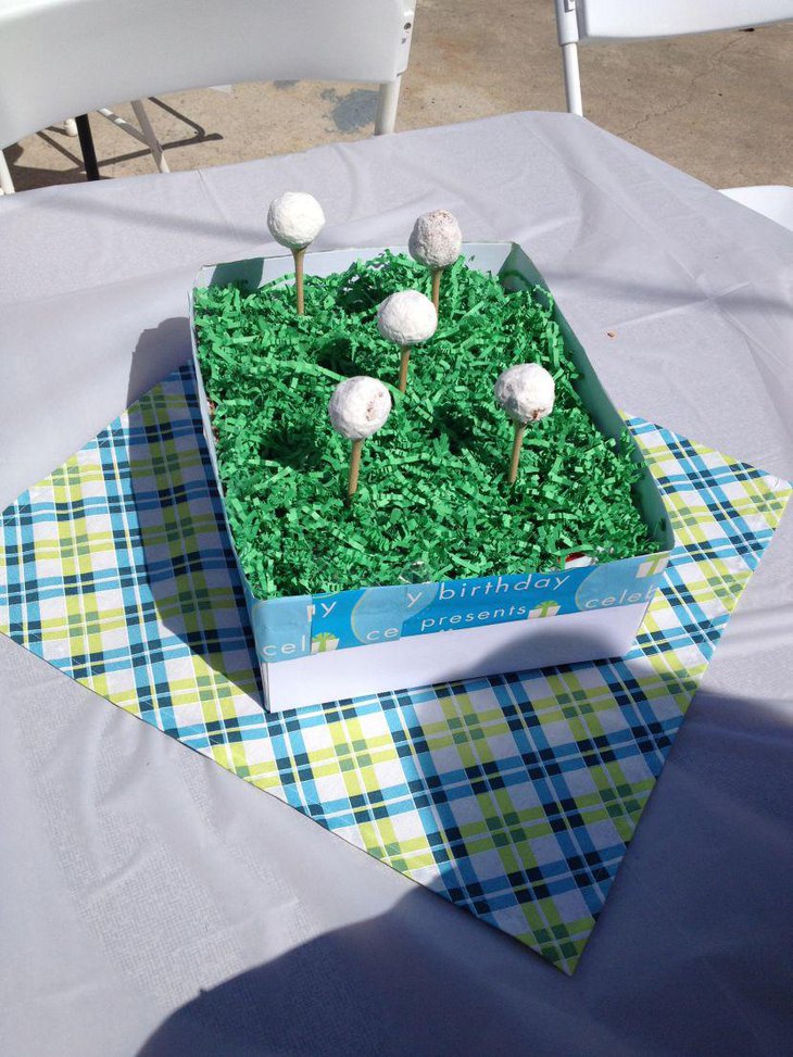 Gorgeous golf centerpiece for 80th birthday party table