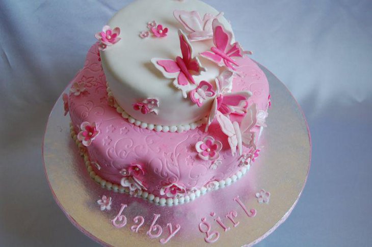 Gorgeous pink and white butterfly baby shower cake