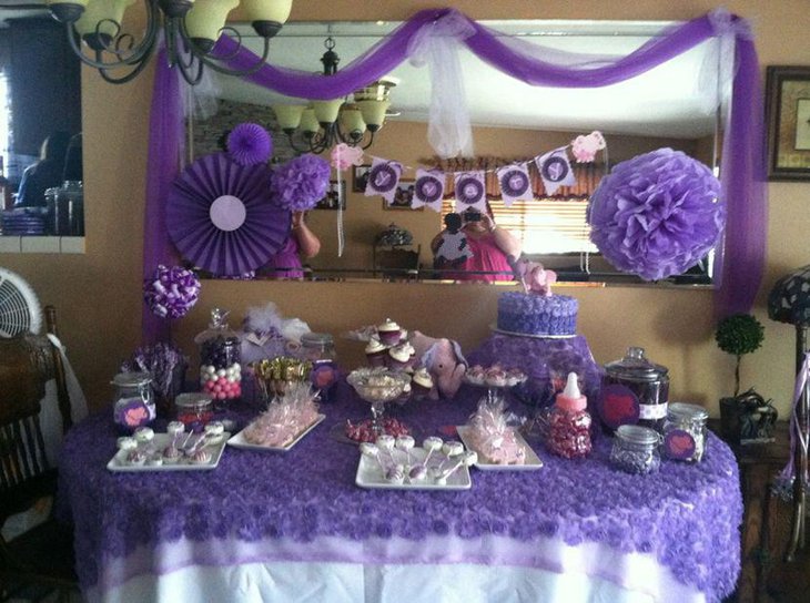 Gorgeous purple baby shower candy table decor