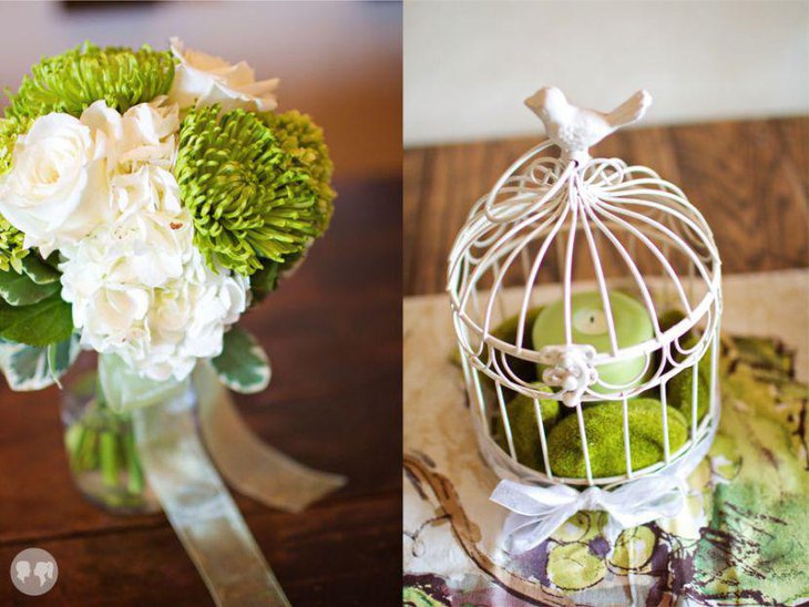 Green candle decor and moss birdcage centerpiece