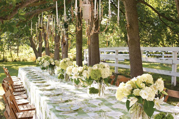 Green floral arrangements for garden party table