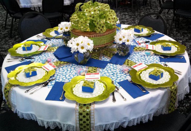 Green spring table centerpiece along with flowers