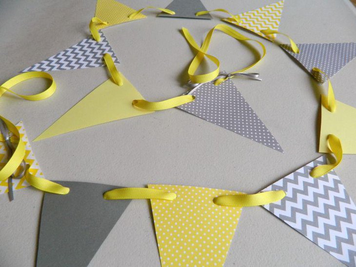 Grey and yellow paper garland for DIY baby shower table decoration