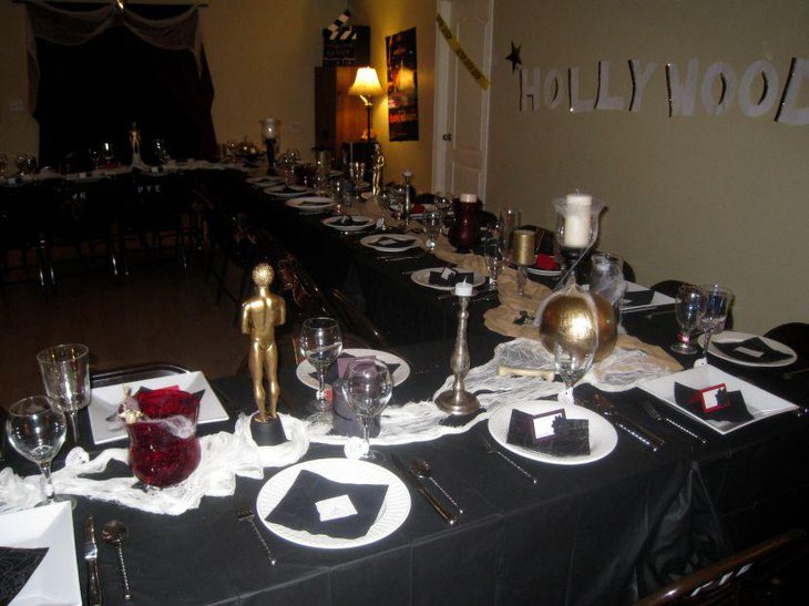 Halloween party table decor with Hollywood theme in golden accents
