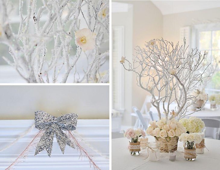 Icy branch centerpiece and floral decorations on winter wonderland birthday table