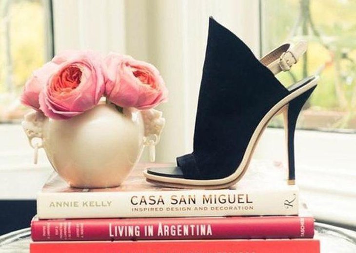 Innovative books shoes and floral centerpiece ideas for small coffee table