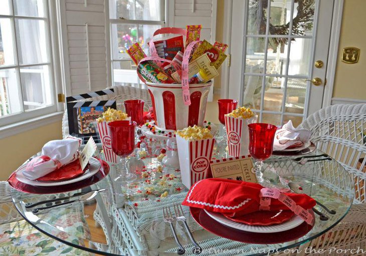 Kids Movie Night party table decorations using red and white colour palette