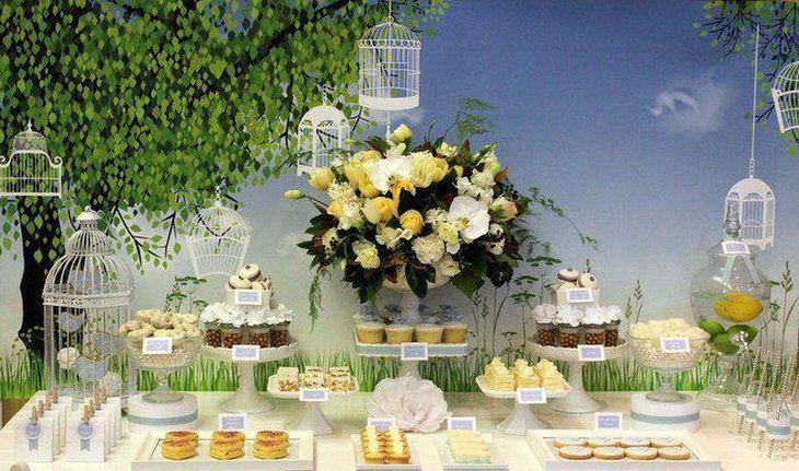 Little birdie garden party table decor with cute cages