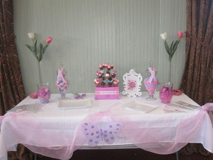 Lovely pink butterfly themed baby shower table