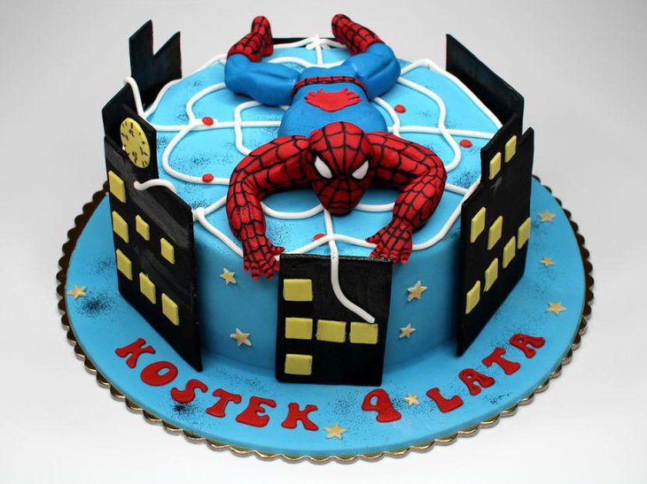 Lovely Spiderman cake with Spiderman on top of it