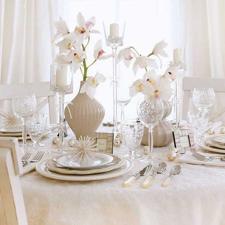 Magnificent White Floral Arrangements In Cream Vases For Christmas Table