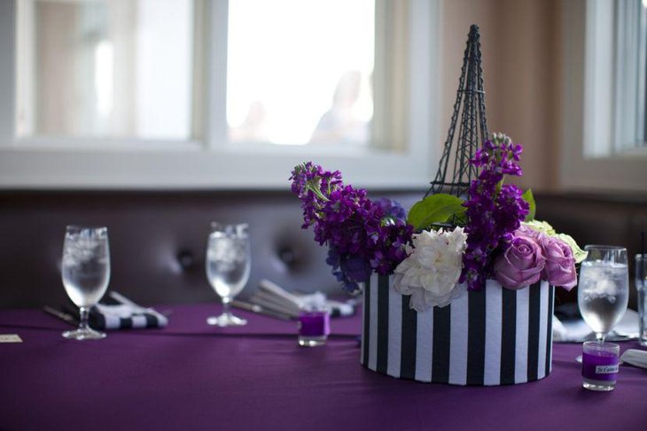 Mesmerizing Parisian themed spring wedding table decor in purple