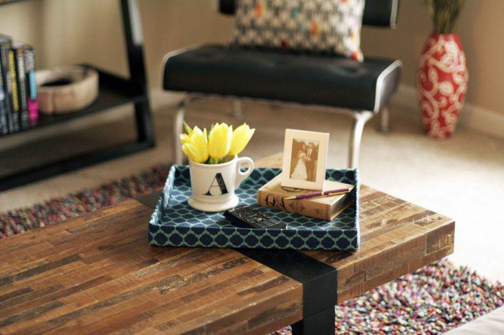 Modern coffee table decor with DIY cardboard tray and flowers