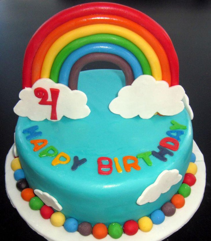 Multicolored rainbow themed birthday cake