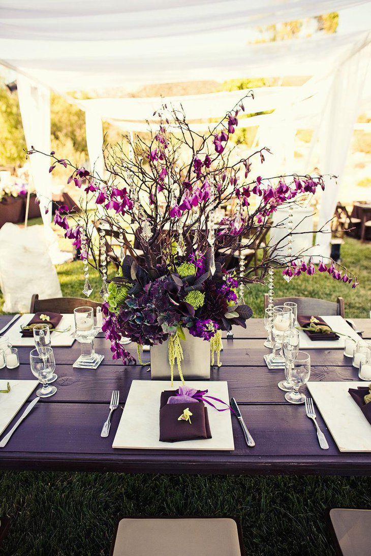 Outdoor purple themed wedding table decor