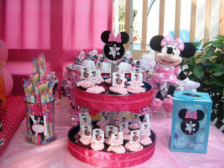 Pink accented Minnie Mouse candy buffet tablescape