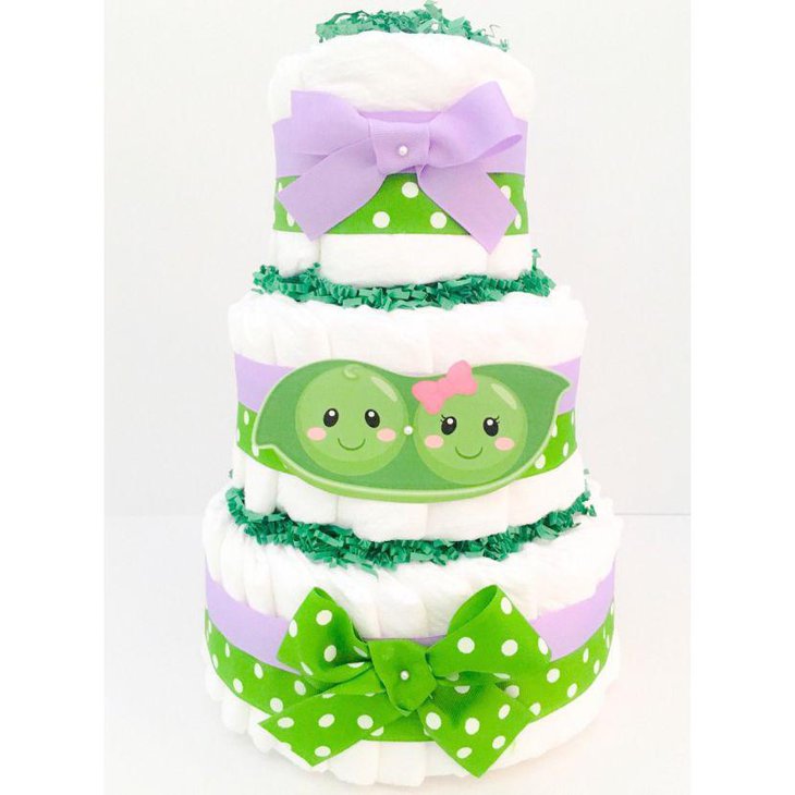 Polka dotted two peas in a pod themed twin diaper cake