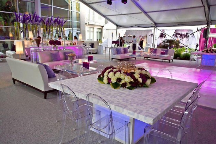 Purple floral decor on party table