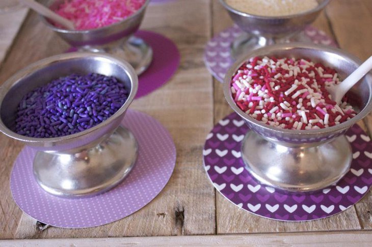 Purple table decor on kids birthday candy table