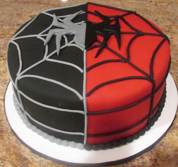 Red and black Spiderman cake with spider web