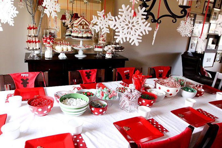 Red and white themed Christmas party table decor