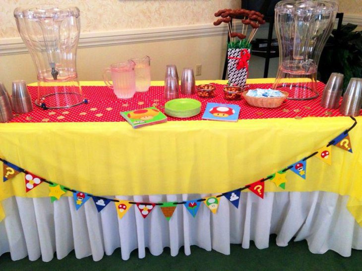 Red and yellow accented retirement party table decor