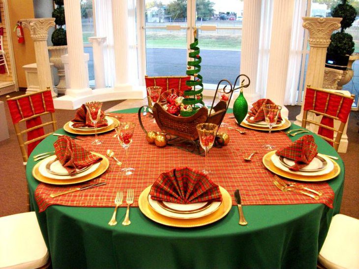 Red checkered tablecloth decorated on the Christmas table