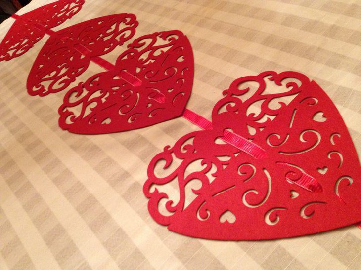 Red heart shaped table mats as Valentines table decor