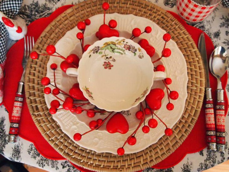 Red hearts and cherry decorations on Valentines table