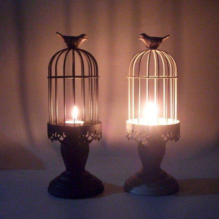 Rustic birdacage candle centerpiece on wedding table