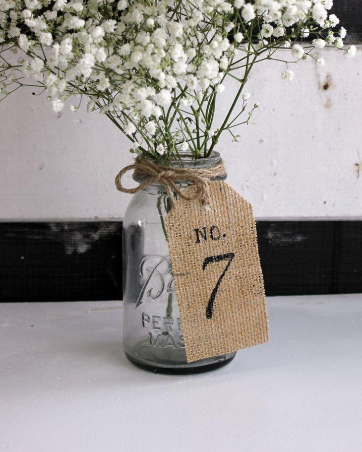 Rustic Wedding Table Burlap and Twine Wrapped Bottle With Flowers