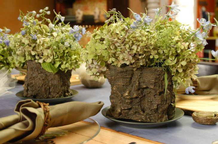 Rustic wooden vases with greens looks fresh