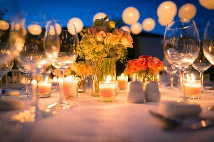 Sassy garden party table decor with candles in votives