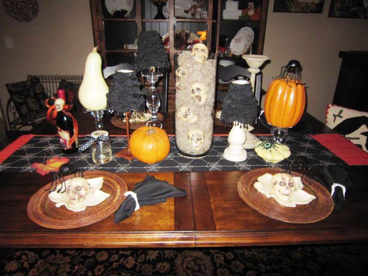 Scary glass jar filled with white skulls as Halloween centerpiece