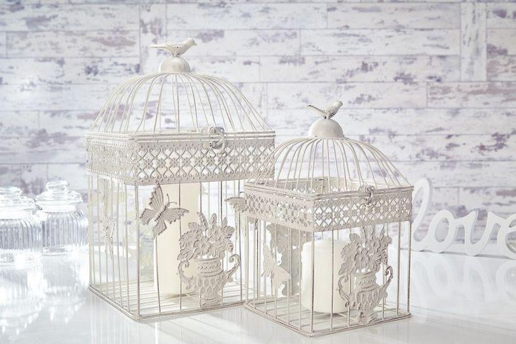 Shabby chic birdcage with white candle wedding table centerpiece