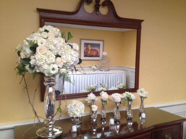Silver floral vase centerpiece for vintage wedding table