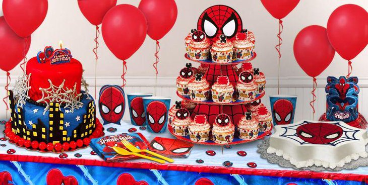Spiderman dessert table with three tier holder for cupcakes