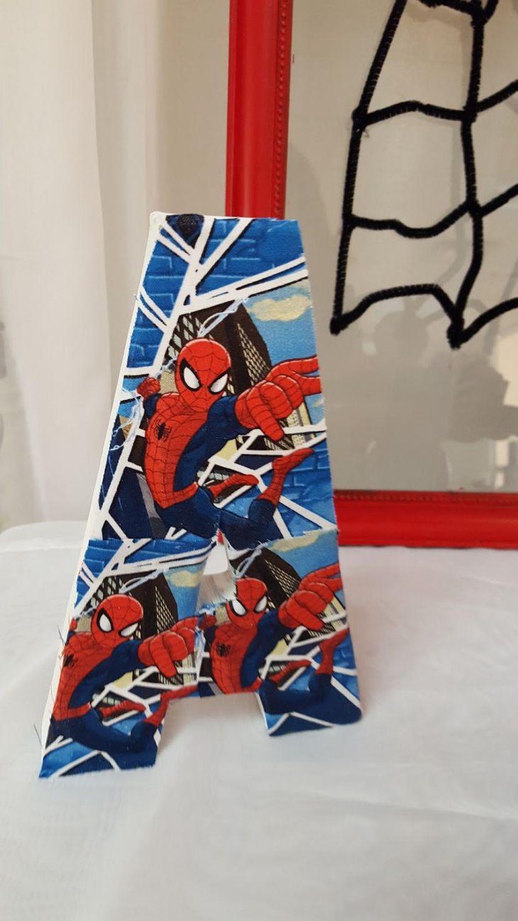 Spiderman theme centerpiece for Spiderman birthday party table
