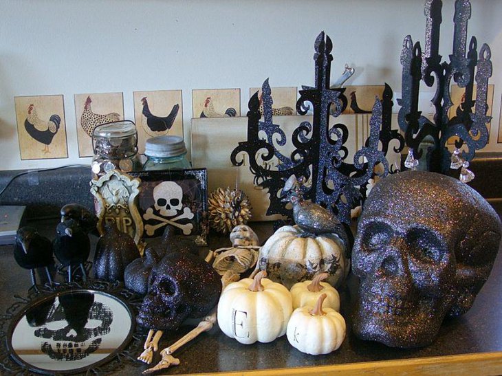 Spooky glittery skulls and pumpkins as Halloween table decorations
