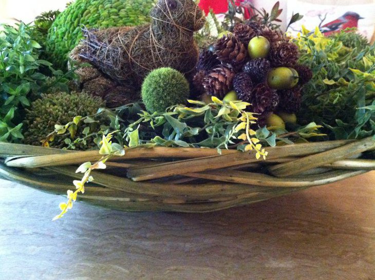 Spring table decor with moss balls and greens