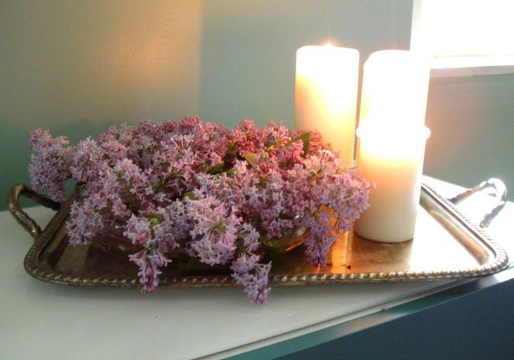 Spring tray and candle centerpiece with lilacs