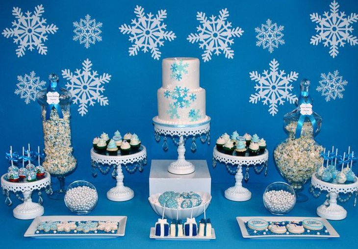 Stunning blue candy table idea with snowflakes